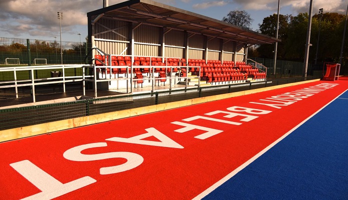 Upward shot of the new hockey pitch at Queen's with red and blue flooring