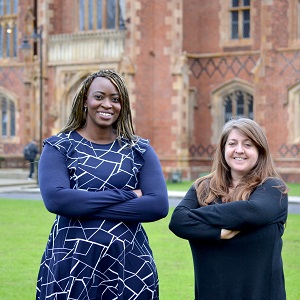 Academics from the Gender Network stand proudly at the Lanyon building