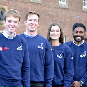 Scrubs society pose in matching jumpers