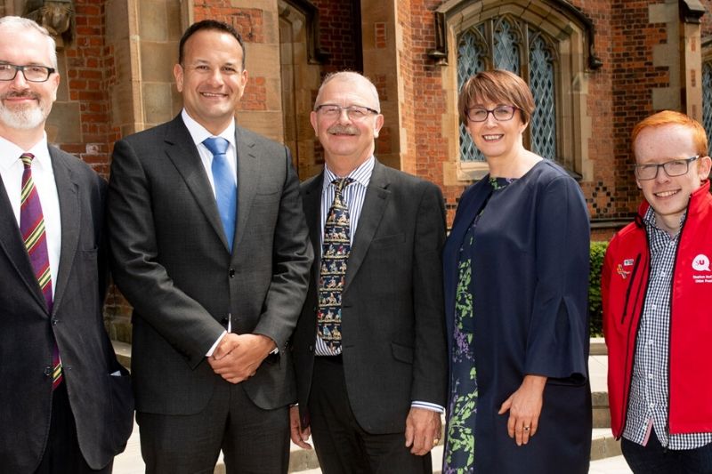 Leo Varadkar with staff in front of the Lanyon