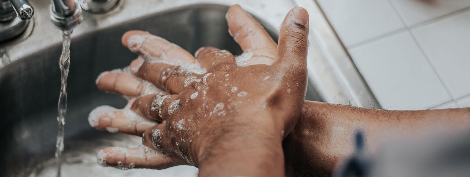 Man washing his hands