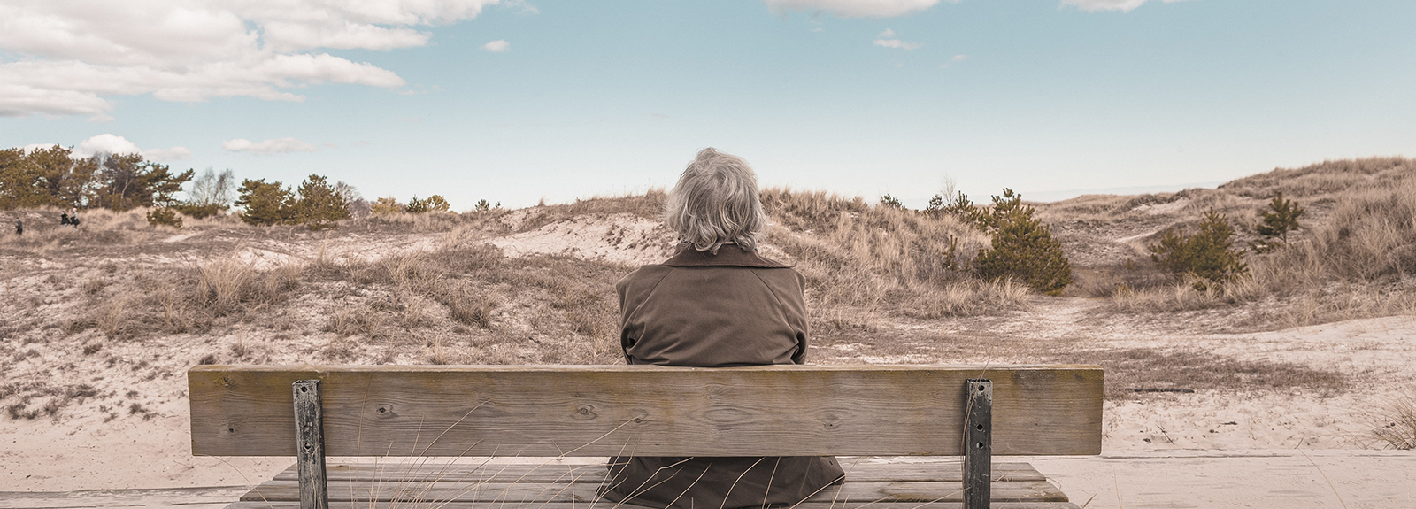 woman alone on a bench