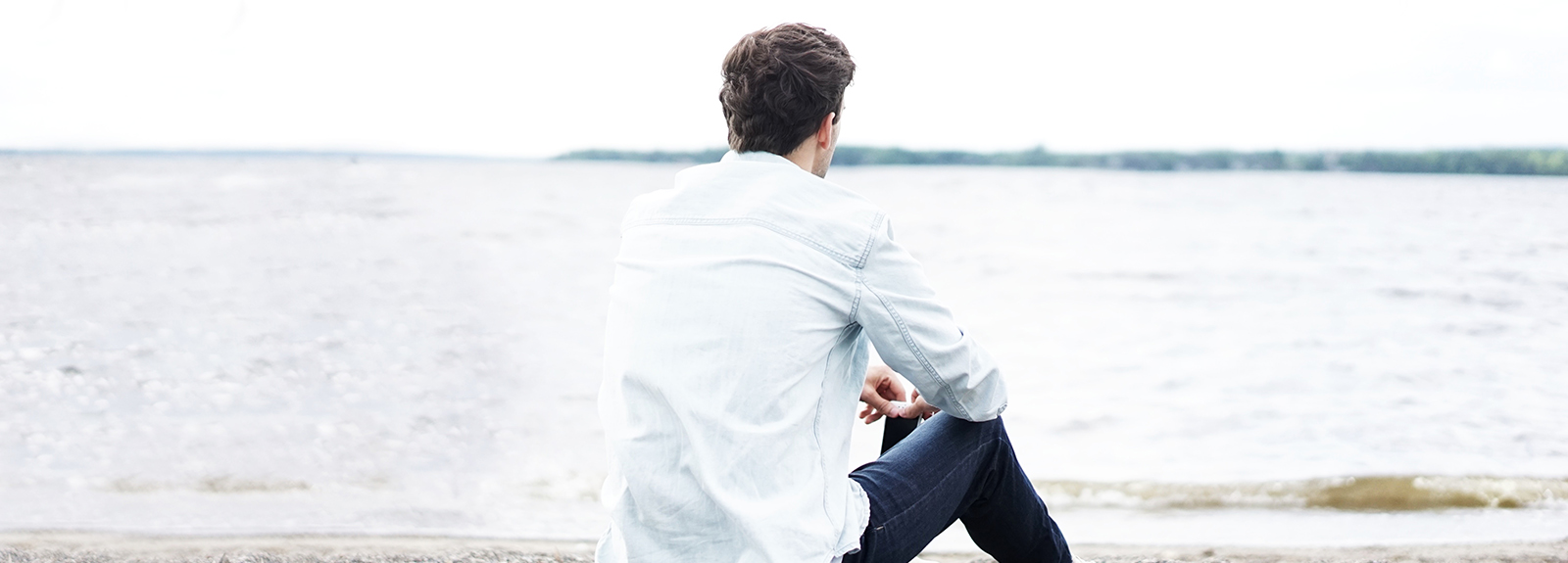 man alone on a beach