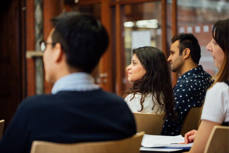 Four students sitting