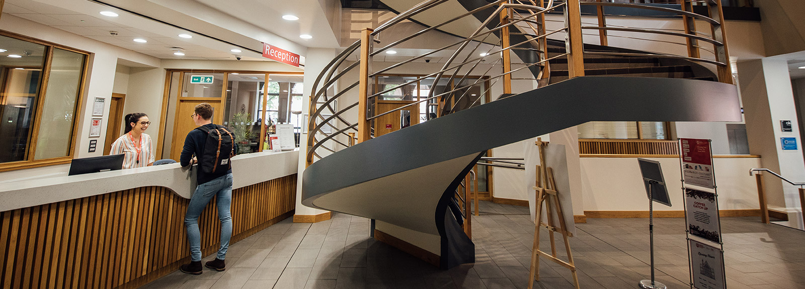 Graduate School reception desk and stairs