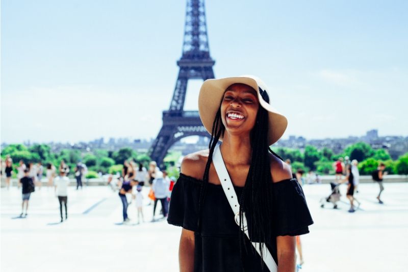 Girl in front of the Eiffel Tower