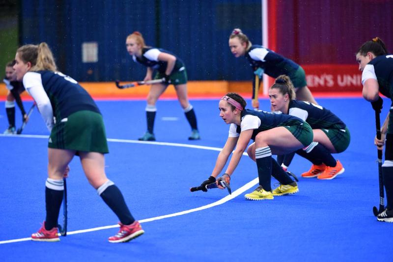 Dynamic shot of hockey players signalling for the ball