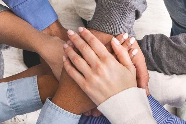 Hands on top of each other