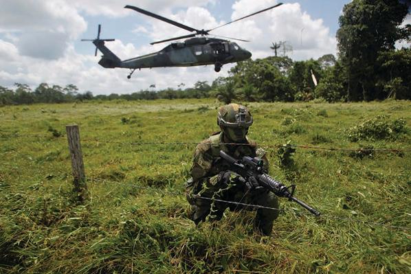 Soldier and helicopter
