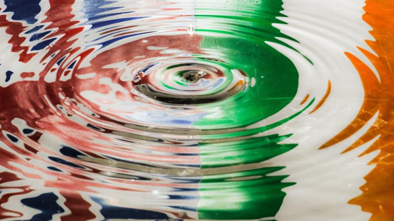 Union Jack and Tricolour in a rippling puddle
