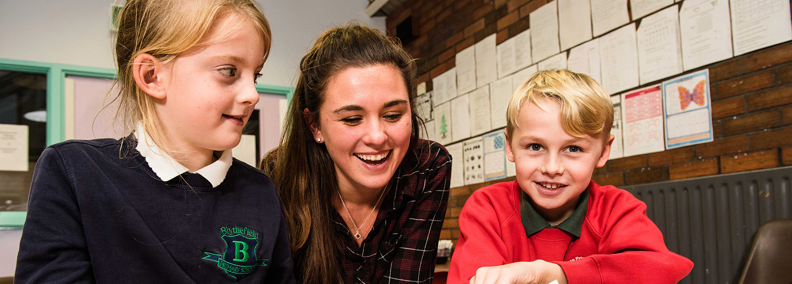 Volunteer with school pupils