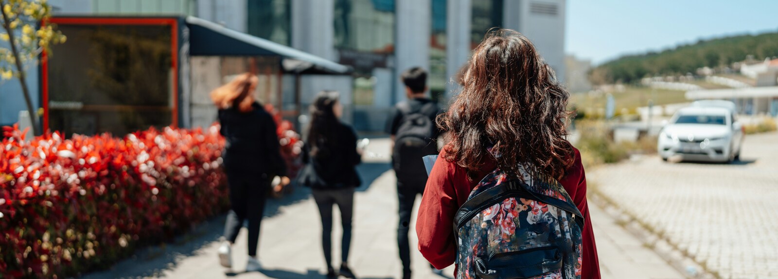 Student walking with backpack
