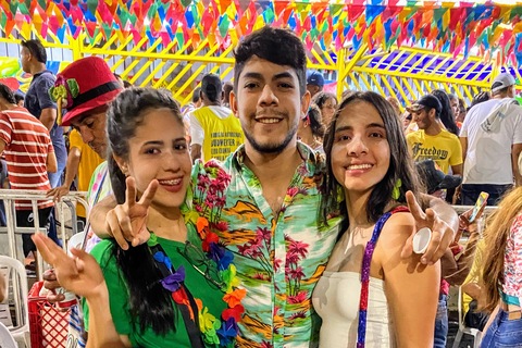3 people posing together at Barranquilla Festival
