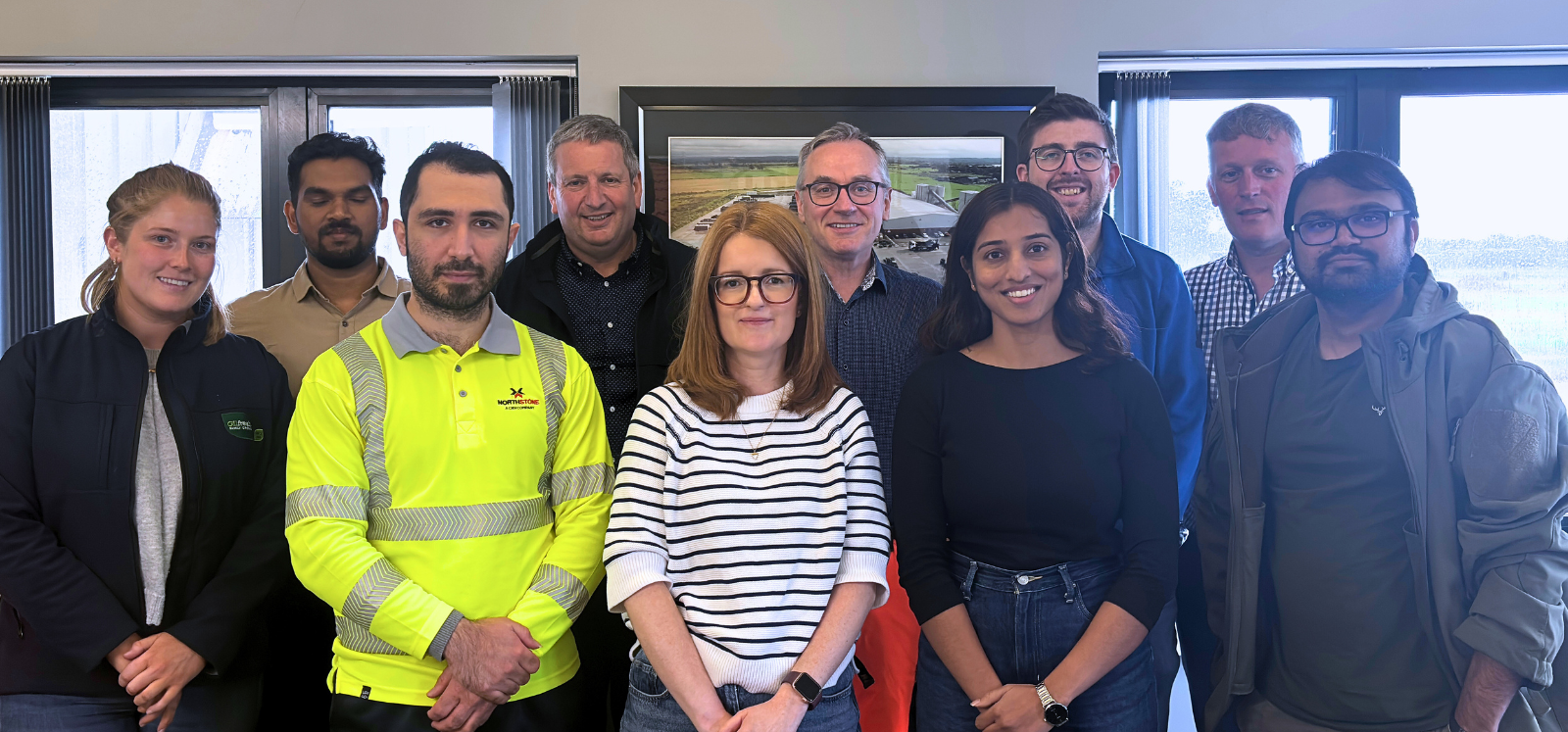 Group of KTP Associates during a site tour at Northstone Materials’ Toomebridge facility, standing in company board room