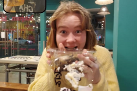 Student eating boojum burrito bowl