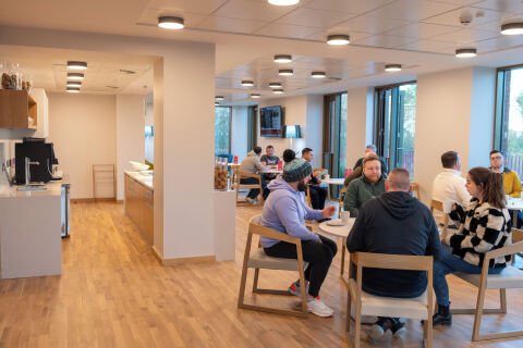 Students networking at Queen's Business School