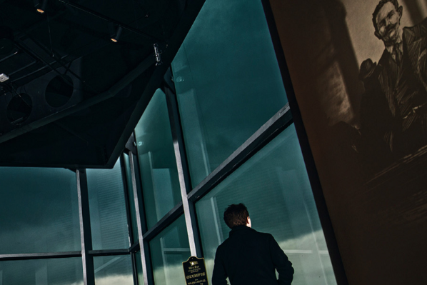 Man looking out of window
