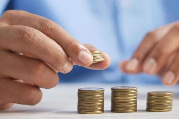 Person counting coins