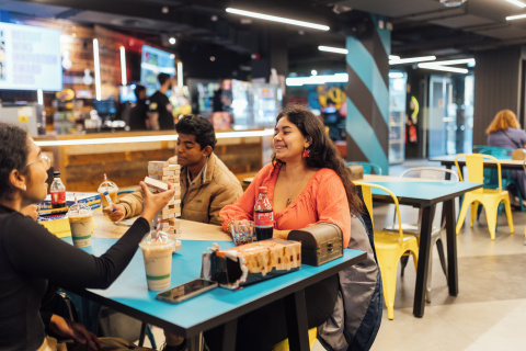 Student Diana playing jenga in Reboot Cafe
