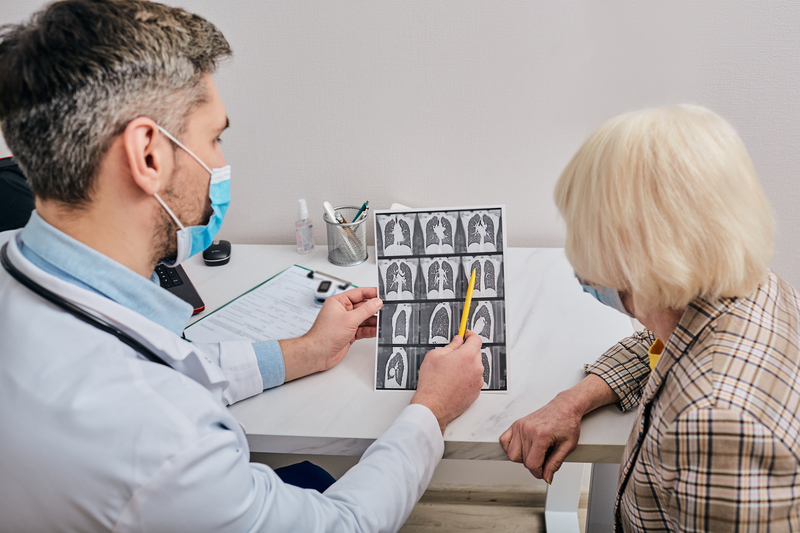 Doctor showing patient x-ray results