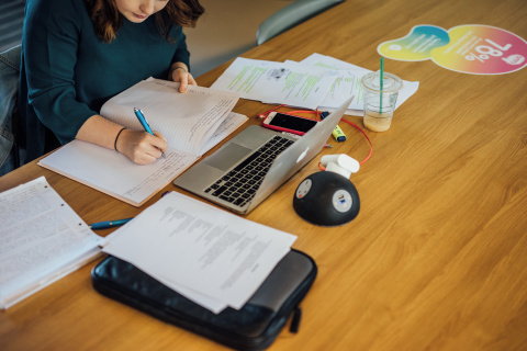 Female student working at desk