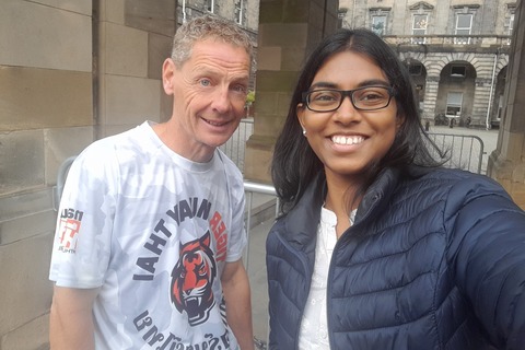 Student Florence with caricature artist in Edinburgh