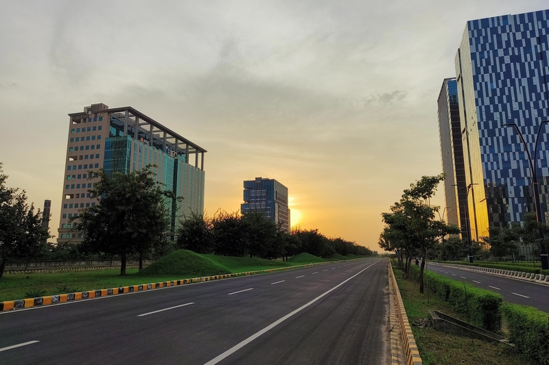 GIFT City - road with buildings on either side