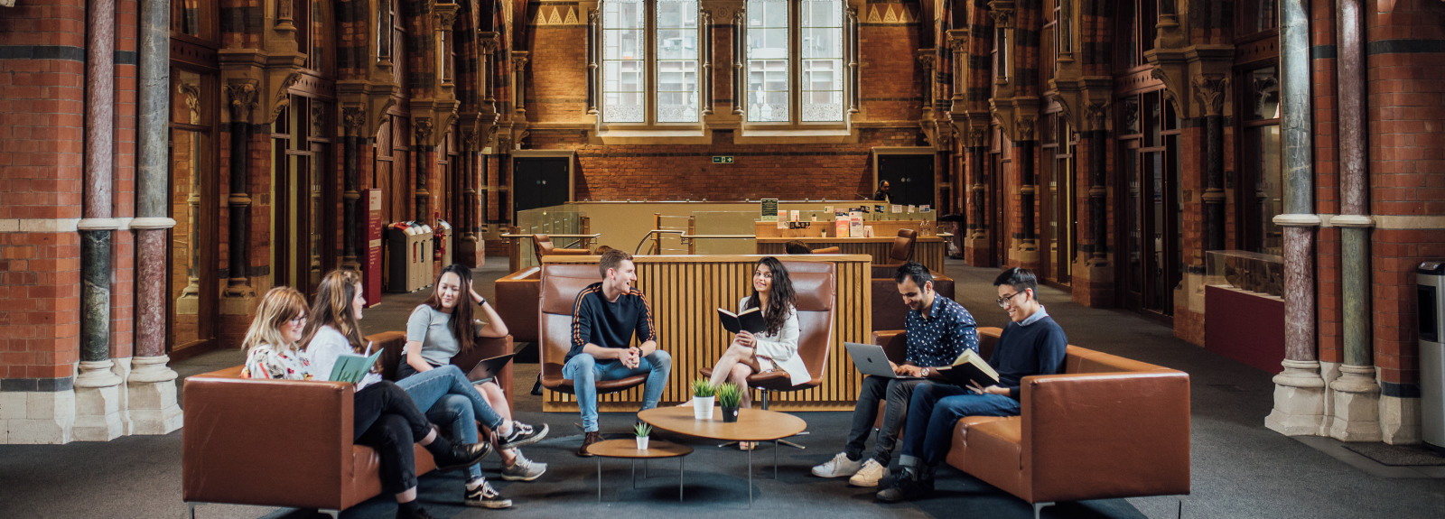 Students sitting together in the Thomas J Moran Graduate School