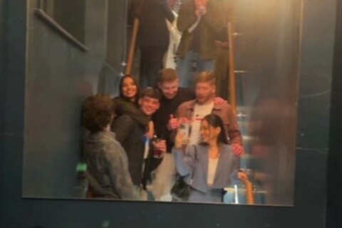 Group of people on the stairs in the National bar