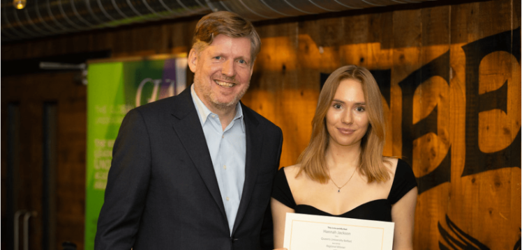 Queen's student Hannah Jackson is pictured with her award