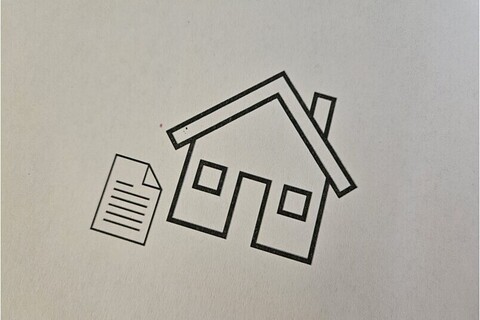 Drawing of house and contract