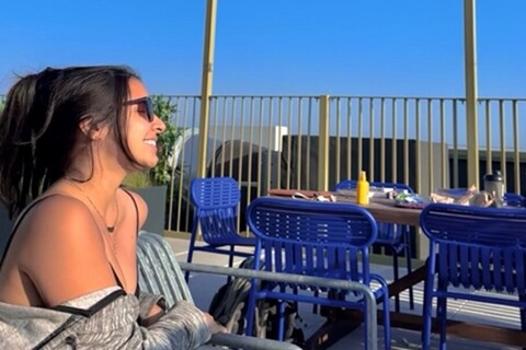 Student sitting on rooftop