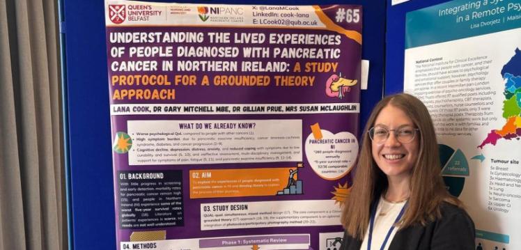 PhD student Lana presenting her work at a conference