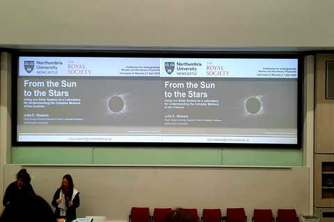 Astrophysics conference lecture screen