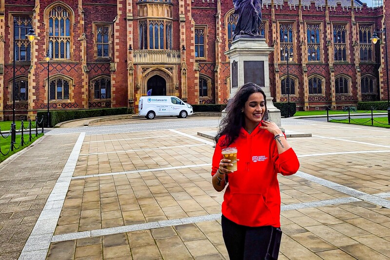 Student in front of Lanyon