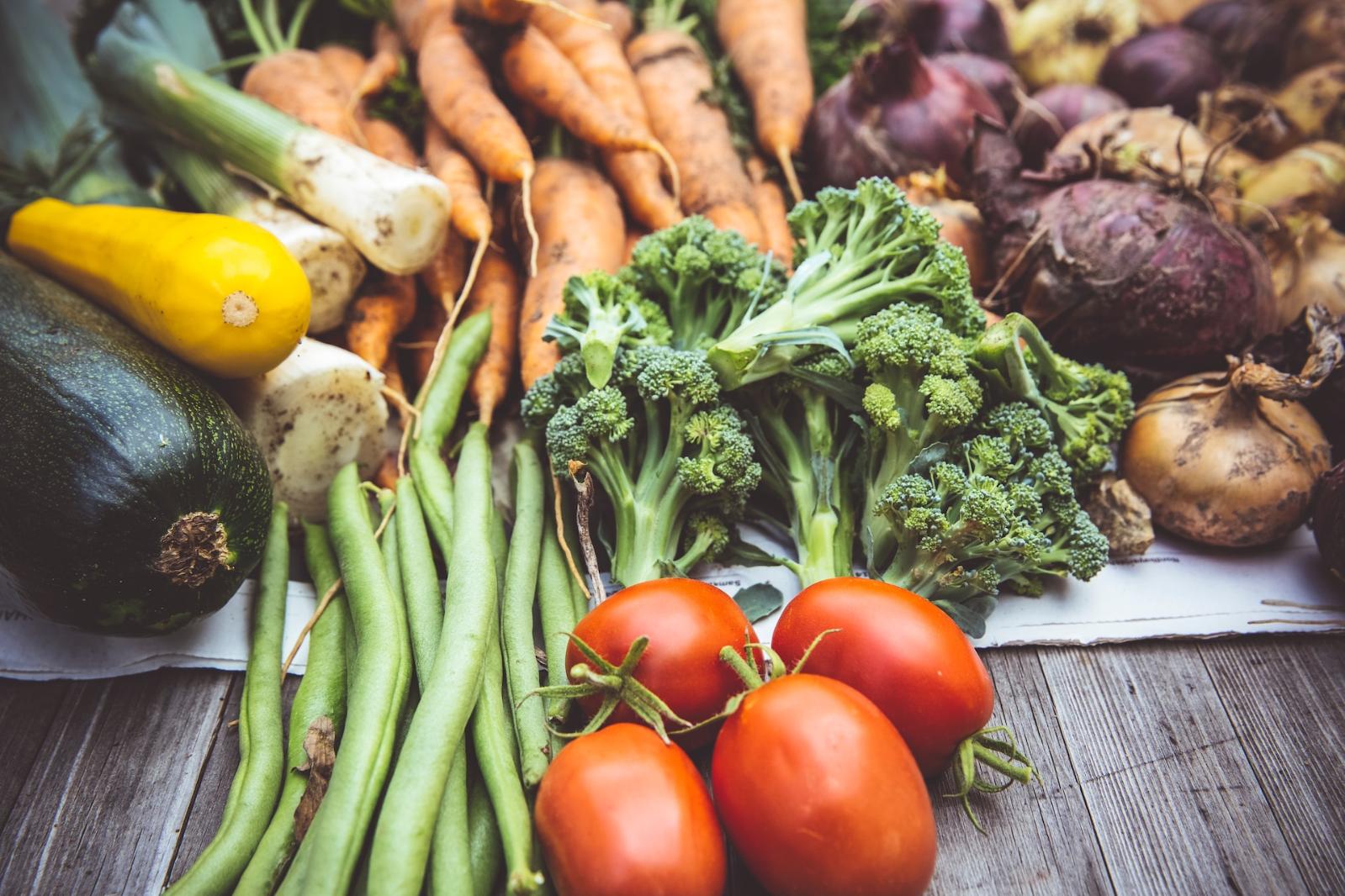 Table with an array of harvested vegetables