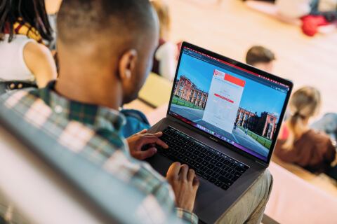 Student looking at MyFuture website on laptop