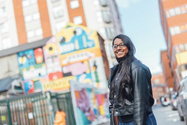 Student Natasha smiling in Belfast street