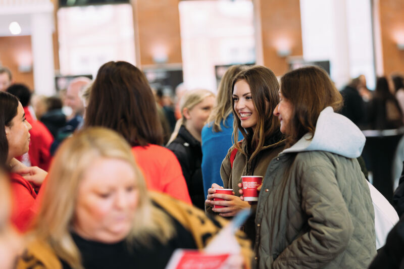 Students and staff chat on offer holder day