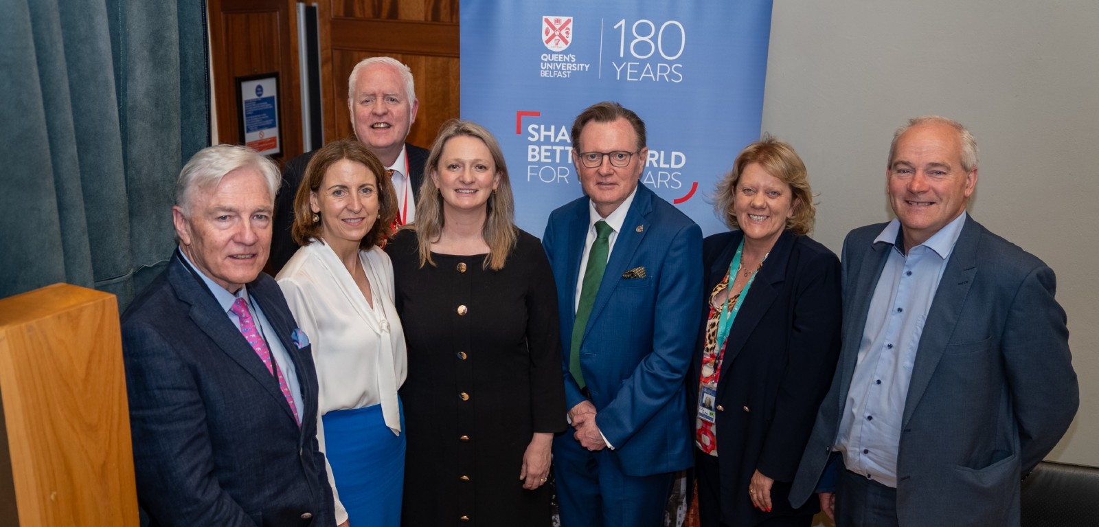 A picture of academics from Queen's University alongside Emer Currie TD at Leinster House