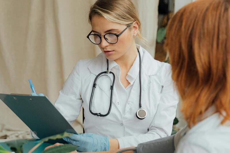 A Patient Having a Consultation with Her Doctor