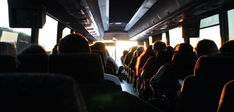 Group of people sitting on bus