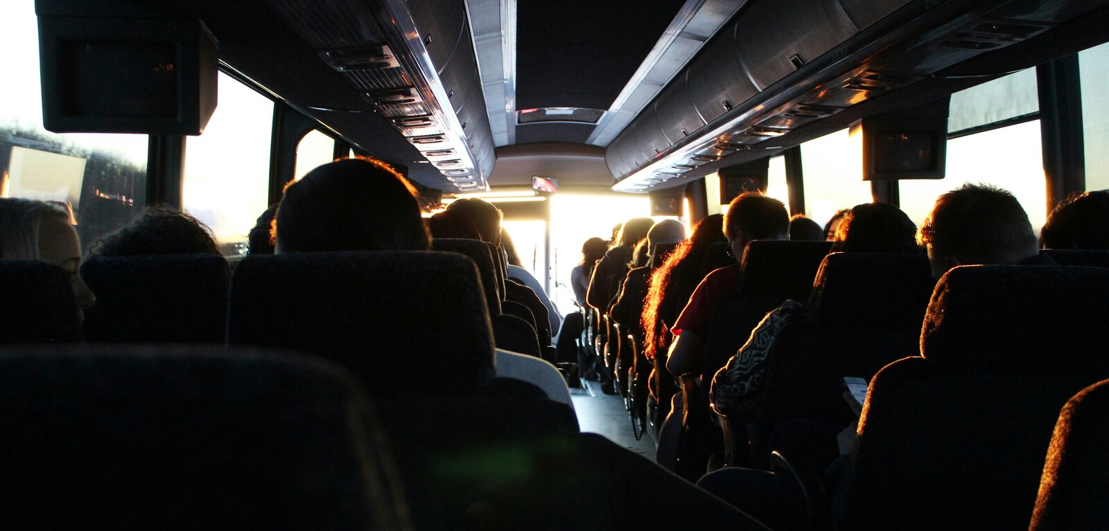Group of people sitting on bus