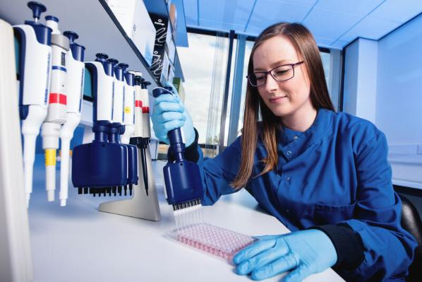 PMC staff working with pipettes