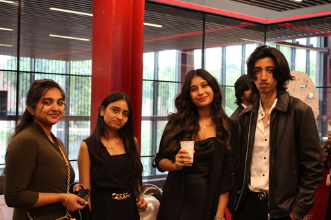Group of four students at Psychology social event