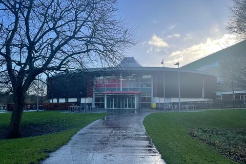 Outside the front of Queen's PEC