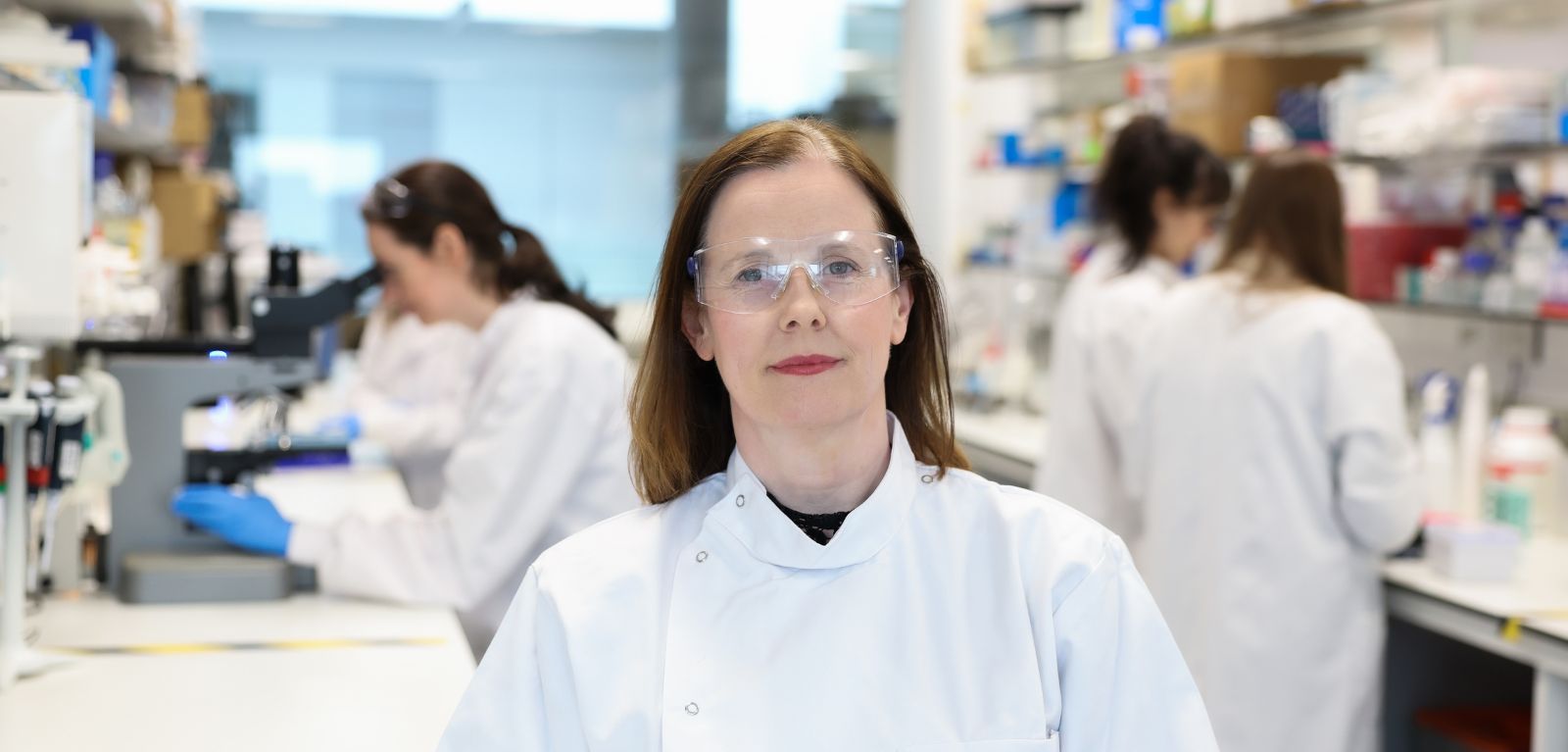 Woman in a lab coat in a lab