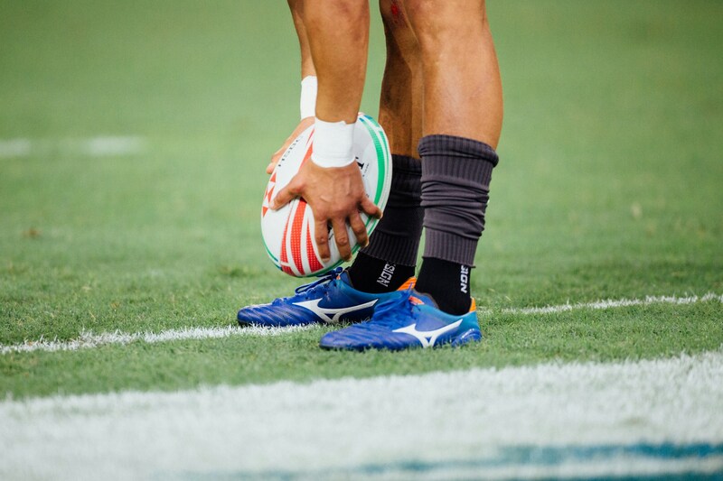 Rugby player holding ball