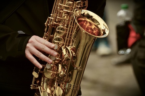 Person playing saxophone