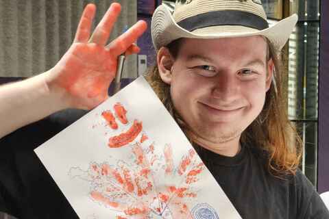 Member of Scream Queen's Society with painting